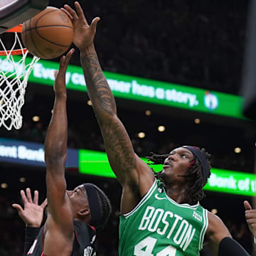 May 29, 2023; Boston, Massachusetts, USA; Boston Celtics center Robert Williams III (44) blocks Miami Heat forward Jimmy Butler (22)