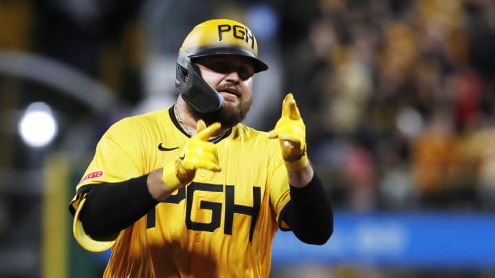 Jul 5, 2024; Pittsburgh, Pennsylvania, USA;  Pittsburgh Pirates first baseman Rowdy Tellez (44) gestures as he circles the bases on his second home run of the game this one a grand slam home run against the New York Mets during the eighth inning at PNC Park. The Pirates won 14-2. Mandatory Credit: Charles LeClaire-USA TODAY Sports