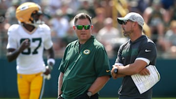 Green Bay Packers General Manager Brian Gutekunst talks with head coach Matt LaFleur during fifth day of training camp