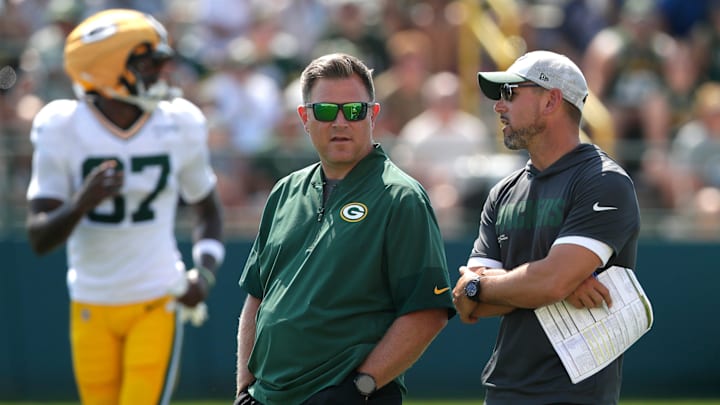 Green Bay Packers General Manager Brian Gutekunst talks with head coach Matt LaFleur during fifth day of training camp