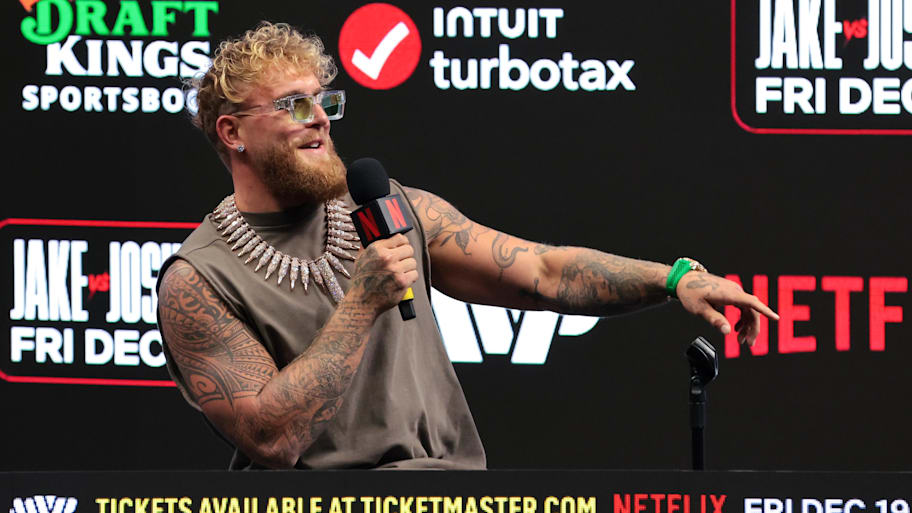 Jake Paul speaks to reporters during a press conference announcing his heavyweight boxing match against Anthony Joshua