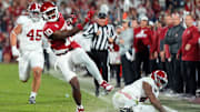Oklahoma Sooners linebacker Kip Lewis returns an interception for a touchdown against the Alabama Crimson Tide. 