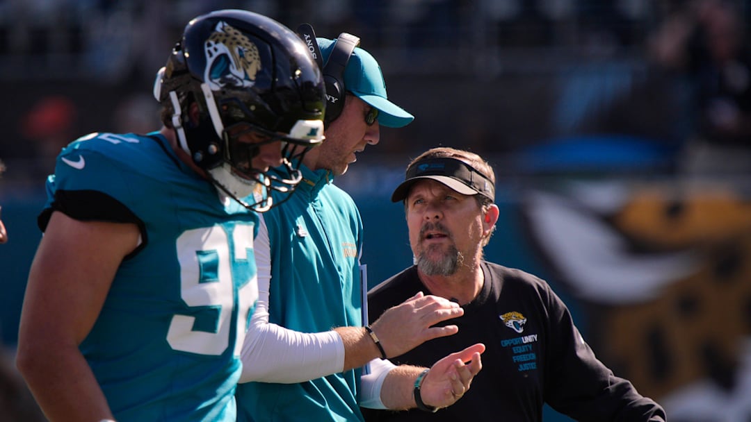 Jacksonville Jaguars head coach Liam Coen talks to one of his staff in the first quarter during an NFL football game at EverBank Stadium, Sunday, Dec. 14, 2025, in Jacksonville, Fla. [Doug Engle/Florida Times-Union]
