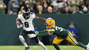 Nov 10, 2025; Green Bay, Wisconsin, USA; Philadelphia Eagles wide receiver DeVonta Smith (6) runs after the catch against the Green Bay Packers in the first half at Lambeau Field. Mandatory Credit: Jeff Hanisch-Imagn Images