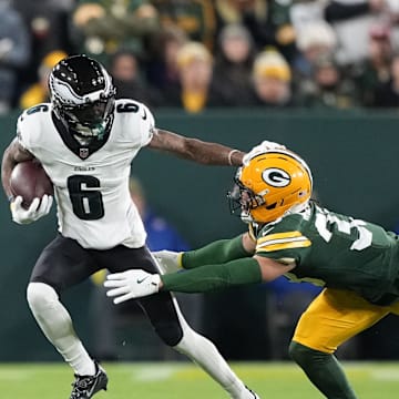 Nov 10, 2025; Green Bay, Wisconsin, USA; Philadelphia Eagles wide receiver DeVonta Smith (6) runs after the catch against the Green Bay Packers in the first half at Lambeau Field. Mandatory Credit: Jeff Hanisch-Imagn Images