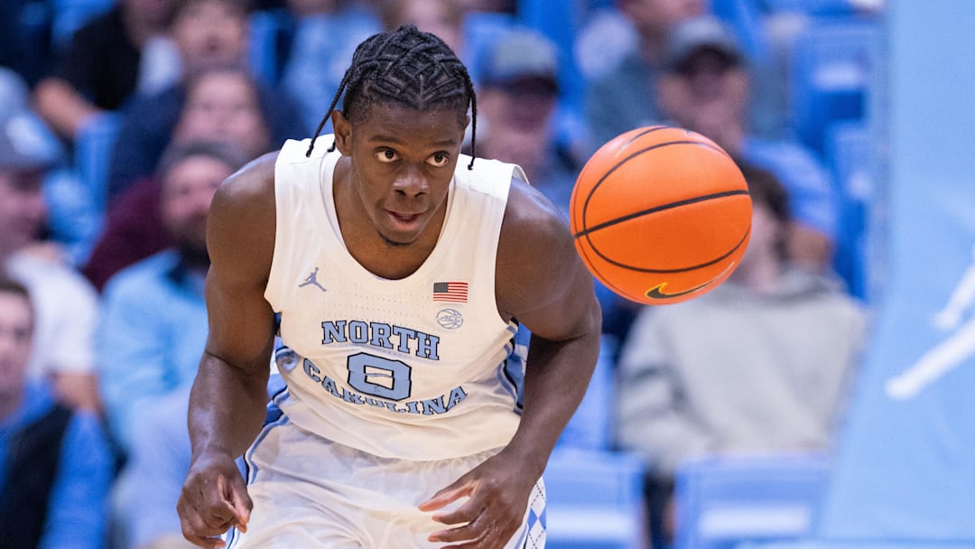 Nov 18, 2025; Chapel Hill, North Carolina, USA; North Carolina Tar Heels forward Caleb Wilson (8) brings the ball up court against the Navy Midshipmen during the second half at Dean E. Smith Center. Mandatory Credit: Scott Kinser-Imagn Images