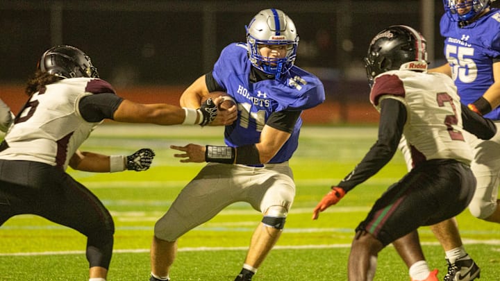 Holmdel’s Jack Cannon weaves his way through tacklers in second half action. Holmdel football falls to Cedar Creek in NJSIAA Group 3 football semifinal at Holmdel High School on November 21, 2025. Holmdel’s Jack Cannon weaves his way through tacklers in second half action. Holmdel football falls to Cedar Creek in NJSIAA Group 3 football semifinal at Holmdel High School on November 21, 2025.