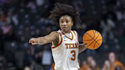 Texas Longhorns guard Rori Harmon runs the offense against the TCU Horned Frogs during the first half of an Elite 8 NCAA Tournament basketball game at Legacy Arena.