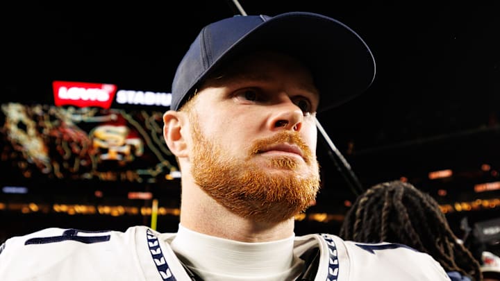 Sam Darnold of the Seattle Seahawks walks off the field