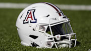 Nov 25, 2022; Tucson, Arizona, USA; Detailed view of an Arizona Wildcats helmet on the field during the Territorial Cup at Arizona Stadium. Mandatory Credit: Mark J. Rebilas-Imagn Images