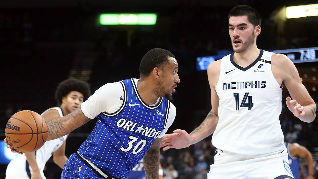 Oct 7, 2026; Memphis, Tennessee, USA; Orlando Magic guard Alex Morales (30) dribbles as Memphis Grizzlies center Zach Edey (14) defends during the second quarter at FedExForum. Mandatory Credit: Petre Thomas-Imagn Images Oct 7, 2026; Memphis, Tennessee, USA; Orlando Magic guard Alex Morales (30) dribbles as Memphis Grizzlies center Zach Edey (14) defends during the second quarter at FedExForum. Mandatory Credit: Petre Thomas-Imagn Images