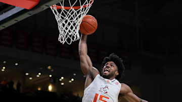 Mar 6, 2024; Coral Gables, Florida, USA; Miami Hurricanes forward Norchad Omier (15) dunks the basketball against the Boston College Eagles during the second half at Watsco Center. Mandatory Credit: Sam Navarro-Imagn Images