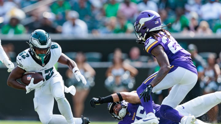 Aug 24, 2024; Philadelphia, Pennsylvania, USA; Philadelphia Eagles wide receiver Ainias Smith (82) is tackled by Minnesota Vikings linebacker Jordan Kunaszyk (45) during the fourth quarter at Lincoln Financial Field. 