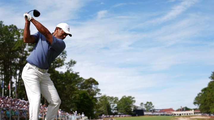 Tiger Woods tees off on the 18th hole during a practice round for the 2024 U.S. Open.