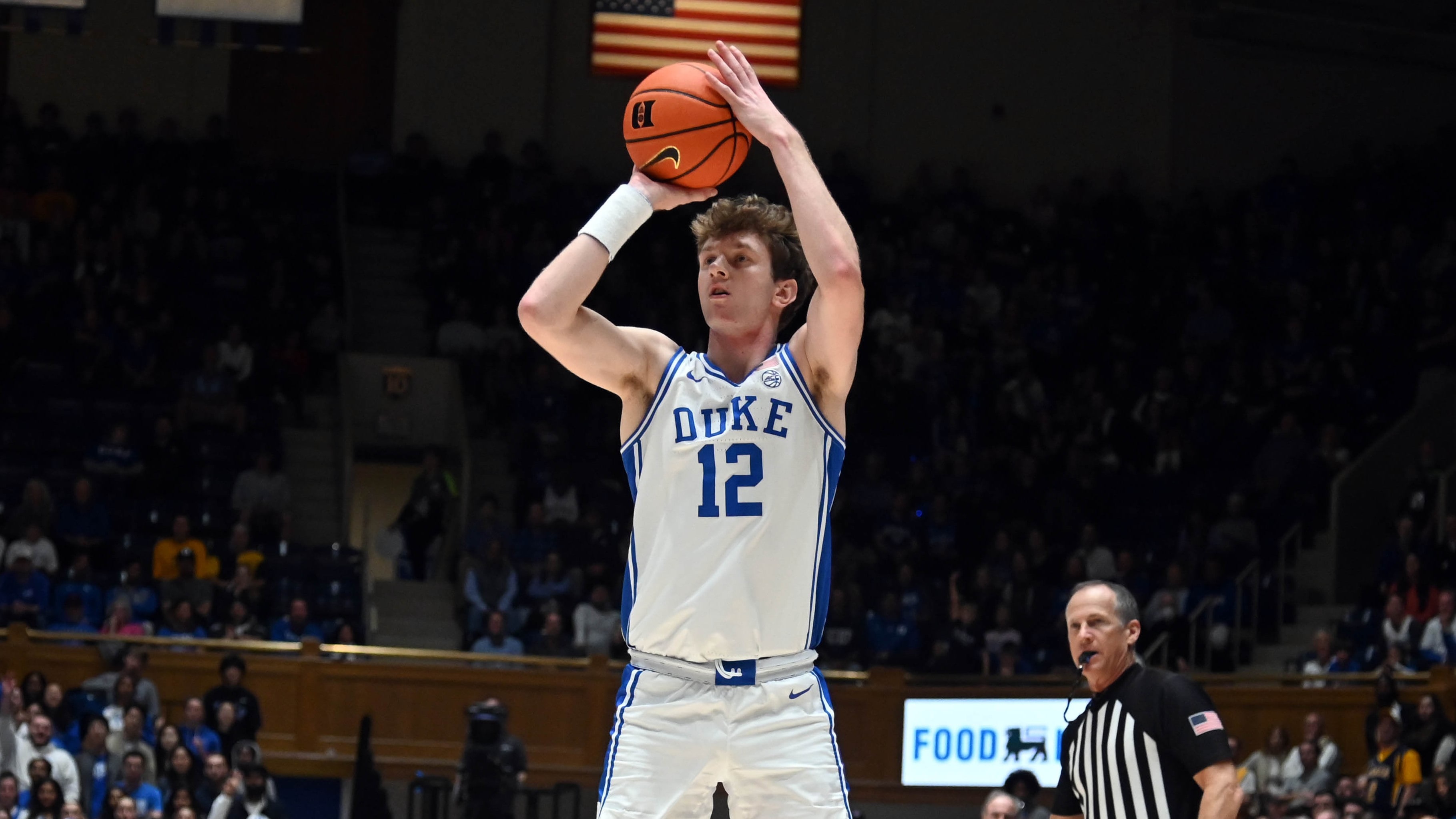 TJ Power shoots a three-pointer during the Duke men's basketball game against La Salle at Cameron Indoor Stadium.
