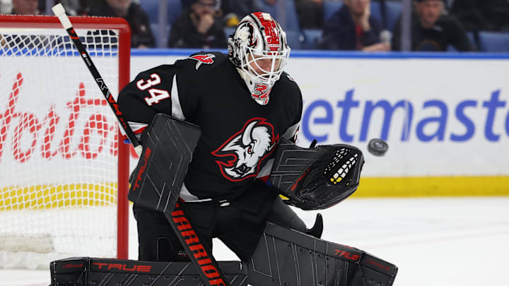Feb 5, 2026; Buffalo, New York, USA;  Buffalo Sabres goaltender Alex Lyon (34) looks to make a save during the third period against the Pittsburgh Penguins at KeyBank Center. Mandatory Credit: Timothy T. Ludwig-Imagn Images