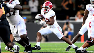 Oct 5, 2024; Nashville, Tennessee, USA;  Alabama Crimson Tide running back Justice Haynes (22) runs the ball against the Vanderbilt Commodores during the second half at FirstBank Stadium. Mandatory Credit: Steve Roberts-Imagn Images