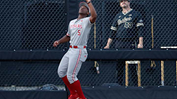 Indiana Hoosiers infielder Devin Taylor (5) catches a fly ball during the NCAA baseball game against the Purdue Boilermakers, Friday, May 3, 2024, at Alexander Field in West Lafayette, Ind. Purdue won 7-4.