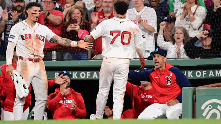 Jun 16, 2024; Boston, Massachusetts, USA; Boston Red Sox left fielder Jarren Duran (16) and manager Alex Cora (13) react to shortstop David Hamilton (70) scoring a run against the New York Yankees during the eighth inning at Fenway Park. Mandatory Credit: Eric Canha-USA TODAY Sports