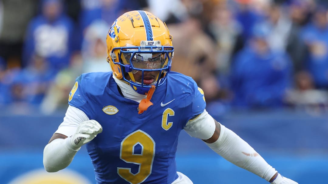 Nov 29, 2025; Pittsburgh, Pennsylvania, USA; Pittsburgh Panthers linebacker Kyle Louis (9) in pass coverage  against the Miami Hurricanes during the third quarter at Acrisure Stadium. Mandatory Credit: Charles LeClaire-Imagn Images