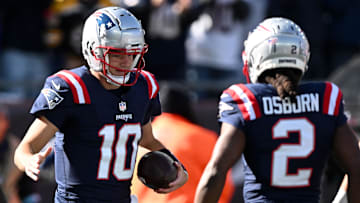 Oct 27, 2024; Foxborough, Massachusetts, USA; New England Patriots quarterback Drake Maye (10) celebrates with wide receiver K.J. Osborn (2) after scoring a touchdown against the New York Jets during the first half at Gillette Stadium. Mandatory Credit: Brian Fluharty-Imagn Images
