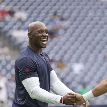 Sep 17, 2023; Houston, Texas, USA; Houston Texans head coach DeMeco Ryans shakes hands with quarterback C.J. Stroud (7) before the game against the Indianapolis Colts at NRG Stadium. Mandatory Credit: Troy Taormina-Imagn Images