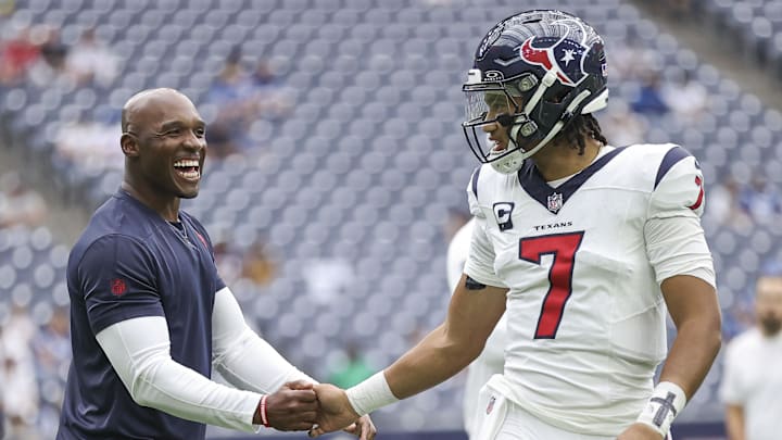 Sep 17, 2023; Houston, Texas, USA; Houston Texans head coach DeMeco Ryans shakes hands with quarterback C.J. Stroud (7) before the game against the Indianapolis Colts at NRG Stadium. Mandatory Credit: Troy Taormina-Imagn Images