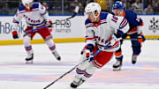 Apr 9, 2024; Elmont, New York, USA; New York Rangers left wing Artemi Panarin (10) skates across the blue line against the New York Islanders during the first period at UBS Arena. Mandatory Credit: Dennis Schneidler-Imagn Images
