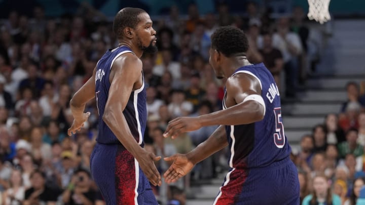 France; United States guard Kevin Durant (7) celebrates with guard Anthony Edwards (5)