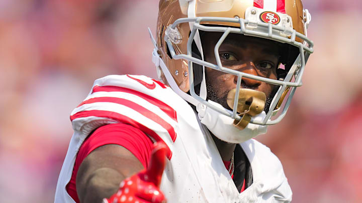 Sep 15, 2024; Minneapolis, Minnesota, USA; San Francisco 49ers wide receiver Brandon Aiyuk (11) signals the referee against the Minnesota Vikings in the first quarter at U.S. Bank Stadium. Mandatory Credit: Brad Rempel-Imagn Images