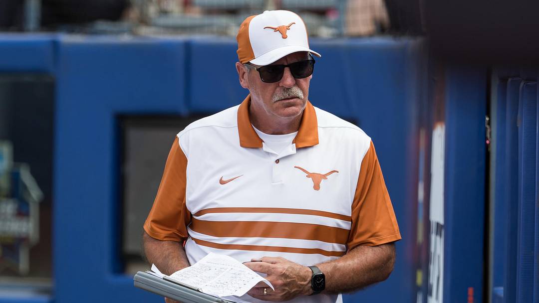 Texas Longhorns head coach Mike White looks into his dugout in the seventh inning against the Tennessee Lady Volunteers. Texas Longhorns head coach Mike White looks into his dugout in the seventh inning against the Tennessee Lady Volunteers.