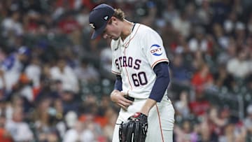 Apr 16, 2024; Houston, Texas, USA; Houston Astros relief pitcher Forrest Whitley (60) walks off the mound after pitching during the ninth inning against the Atlanta Braves at Minute Maid Park. Mandatory Credit: Troy Taormina-Imagn Images