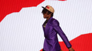 Jun 26, 2024; Brooklyn, NY, USA; Ja'Kobe Walter walks on stage after being selected in the first round by the Toronto Raptors in the 2024 NBA Draft at Barclays Center. Mandatory Credit: Brad Penner-USA TODAY Sports