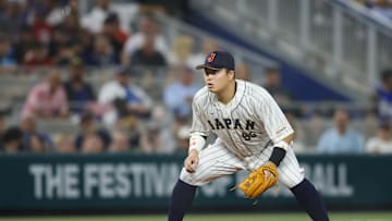 Mar 21, 2023; Miami, Florida, USA; Japan third baseman Munetaka Murakami (55) plays his position during the sixth inning against the USA at LoanDepot Park. Mandatory Credit: Sam Navarro-Imagn Images
