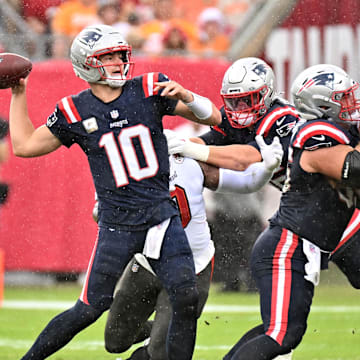 Nov 9, 2025; Tampa, Florida, USA; New England Patriots quarterback Drake Maye (10) throws downfield during the first quarter against the Tampa Bay Buccaneers at Raymond James Stadium. Mandatory Credit: Jonathan Dyer-Imagn Images