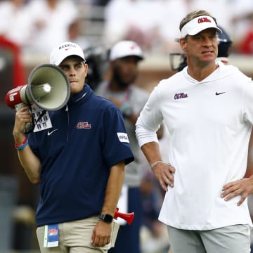 Aug 31, 2024; Oxford, Mississippi, USA; Mississippi Rebels head coach Lane Kiffin watches during warm ups prior to the game against the Furman Paladins at Vaught-Hemingway Stadium. Mandatory Credit: Petre Thomas-USA TODAY Sports