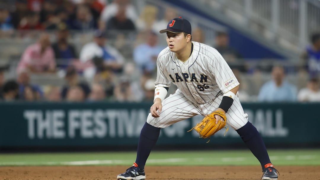 Mar 21, 2023; Miami, Florida, USA; Japan third baseman Munetaka Murakami (55) plays his position during the sixth inning against the USA at LoanDepot Park. Mandatory Credit: Sam Navarro-Imagn Images