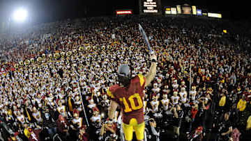 Jan 1, 2009; Pasadena, CA, USA; Southern California Trojans linebacker Brian Cushing (10) celebrates after the Trojans' 38-24 victory over the Penn State Nittany Lions in the Rose Bowl game at the Rose Bowl. Mandatory Credit: Kirby Lee/Image of Sport-Imagn Images