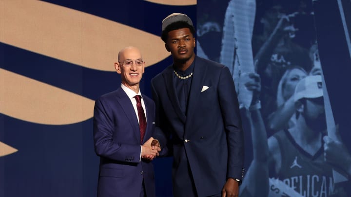 Jun 26, 2024; Brooklyn, NY, USA; Yves Missi poses for photos with NBA commissioner Adam Silver after being selected in the first round by the New Orleans Pelicans in the 2024 NBA Draft at Barclays Center. 