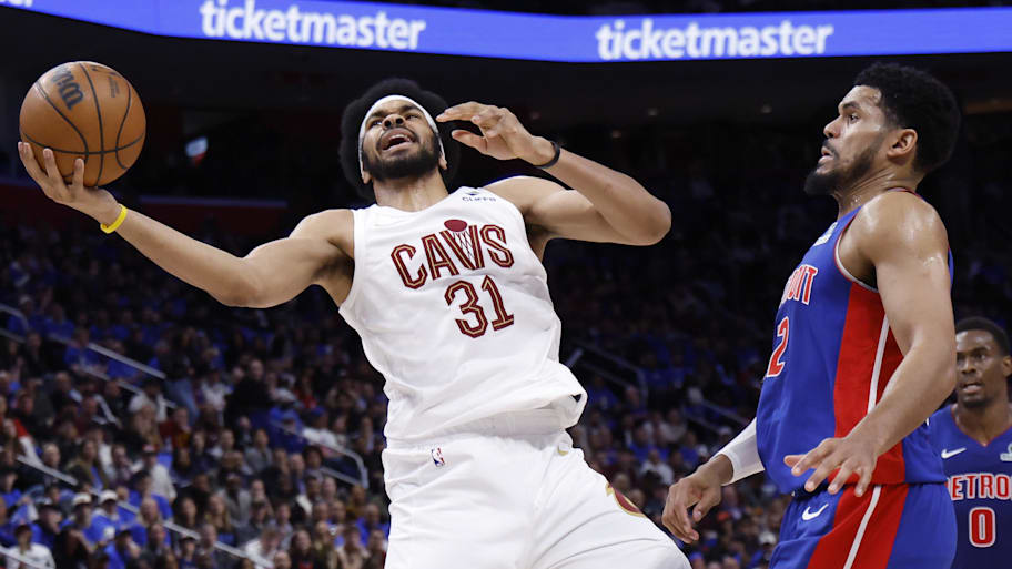 Cavaliers center Jarrett Allen is fouled by Pistons forward Tobias Harris.