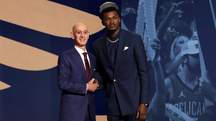 Jun 26, 2024; Brooklyn, NY, USA; Yves Missi poses for photos with NBA commissioner Adam Silver after being selected in the first round by the New Orleans Pelicans in the 2024 NBA Draft at Barclays Center.