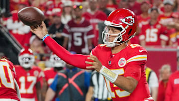Sep 5, 2024; Kansas City, Missouri, USA;  Kansas City Chiefs quarterback Patrick Mahomes (15) throws a pass against the Baltimore Ravens during the first half at GEHA Field at Arrowhead Stadium. Mandatory Credit: Denny Medley-Imagn Images