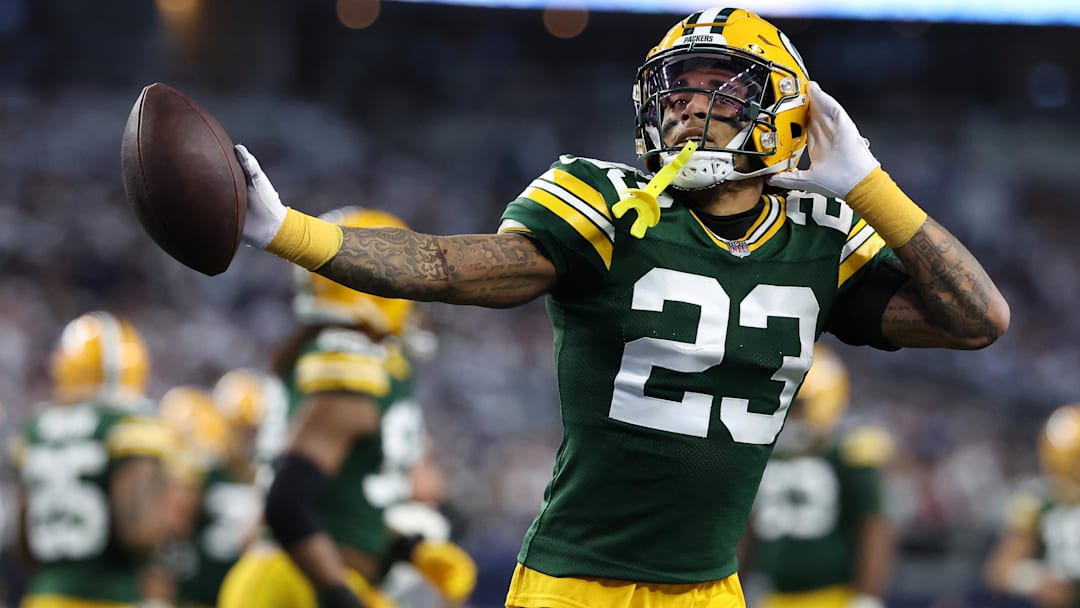 Green Bay Packers cornerback Jaire Alexander (23) reacts after an interception against the Dallas Cowboys in the first half of the 2024 NFC wild card game at AT&T Stadium.