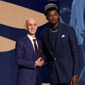 Jun 26, 2024; Brooklyn, NY, USA; Yves Missi poses for photos with NBA commissioner Adam Silver after being selected in the first round by the New Orleans Pelicans in the 2024 NBA Draft at Barclays Center. Mandatory Credit: Brad Penner-USA TODAY Sports
