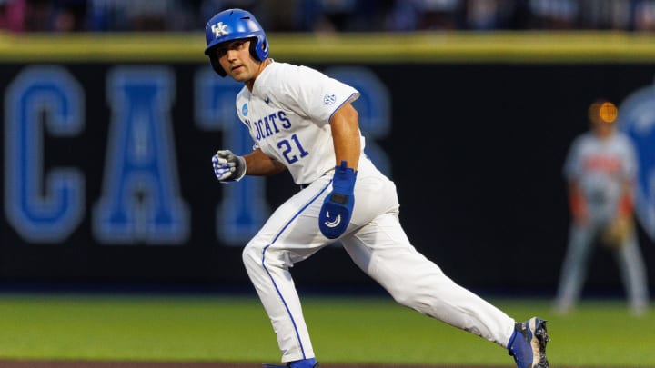 Jun 8, 2024; Lexington, KY, USA; Kentucky Wildcats outfielder Ryan Waldschmidt (21) steals third base during the seventh inning against the Oregon State Beavers at Kentucky Proud Park. Mandatory Credit: Jordan Prather-USA TODAY Sports