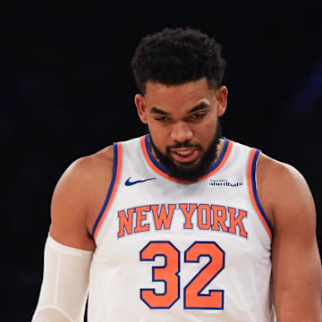 Nov 3, 2025; New York, New York, USA; New York Knicks center Karl-Anthony Towns (32) reacts during the first half against the Washington Wizards at Madison Square Garden. Mandatory Credit: Lucas Boland-Imagn Images