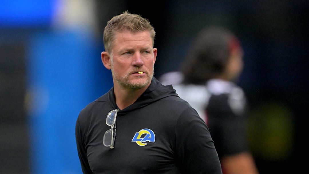 Sep 18, 2022; Inglewood, California, USA; Los Angeles Rams general manager Les Snead watches players warm up before the game against the Atlanta Falcons at SoFi Stadium. Mandatory Credit: Jayne Kamin-Oncea-Imagn Images Sep 18, 2022; Inglewood, California, USA; Los Angeles Rams general manager Les Snead watches players warm up before the game against the Atlanta Falcons at SoFi Stadium. Mandatory Credit: Jayne Kamin-Oncea-Imagn Images