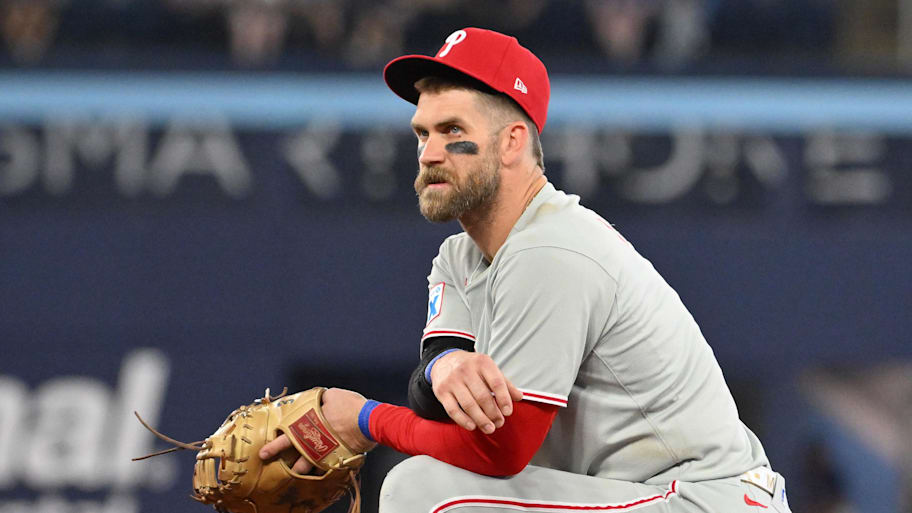 Philadelphia Phillies first baseman Bryce Harper looks on during an injury delay. | Dan Hamilton-Imagn Images