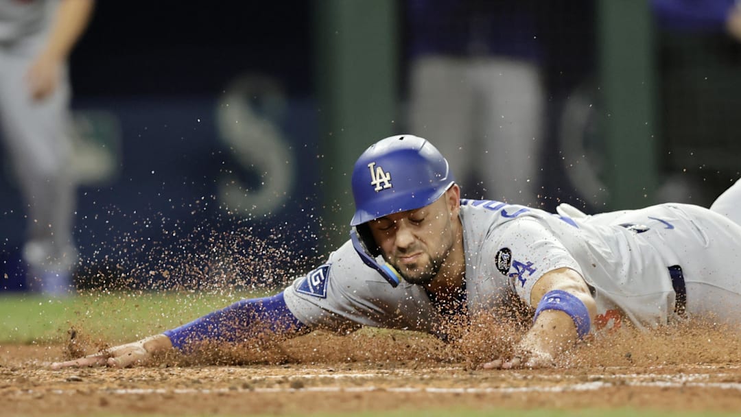 Sep 26, 2025; Seattle, Washington, USA; Los Angeles Dodgers left fielder Michael Conforto (23) scores against the Seattle Mariners during the sixth inning at T-Mobile Park. Mandatory Credit: John Froschauer-Imagn Images