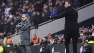 Ange Postecoglu and Ruud van Nistelrooy on the touchline 